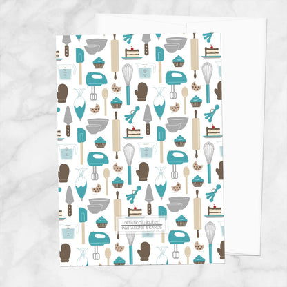 The backside of the Whisked Away Turquoise Baking Bridal Shower Invitation with a kitchen tools and sweets theme, shown on a marble surface with a white envelope.
