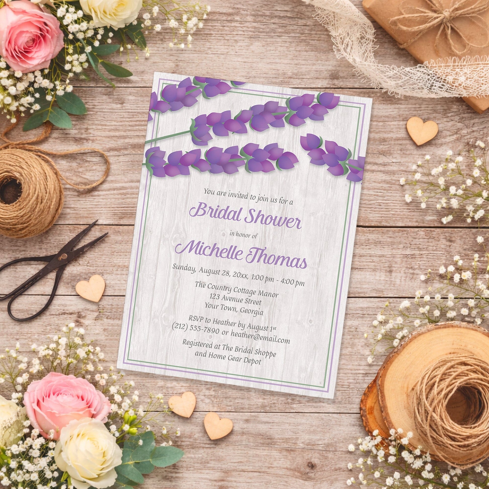Whitewashed Wood Lavender Bridal Shower Invitation shown on a wooden surface with spring and summer flowers, small wood hearts, and twine.