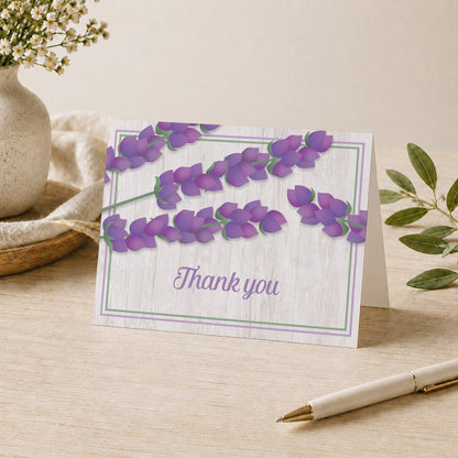 Whitewashed Wood Lavender Thank You Card shown on a desk with a vase and pen.
