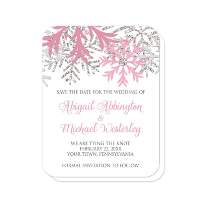 Winter Pink Silver Snowflake Save the Date Cards (with rounded corners) at Artistically Invited. Beautiful winter pink silver snowflake save the date cards designed with pink, light pink, silver-colored glitter-illustrated, and light gray snowflakes along the top over a white background. Your personalized wedding date details are custom printed in pink and gray below the pretty snowflakes.