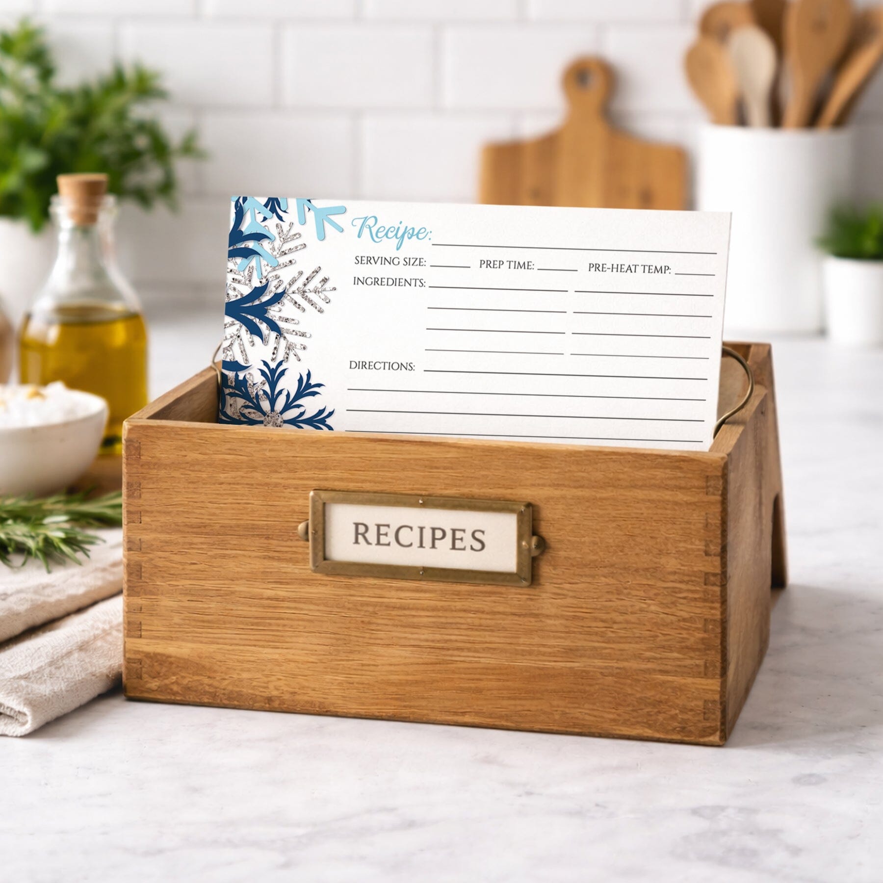 Winter Blue Silver Snowflake Recipe Card shown in a wooden recipe box
