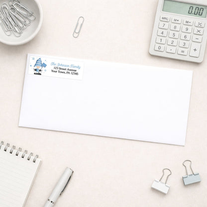 Winter Gnome Address Label shown on a white envelope with office supplies