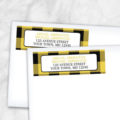 2 Yellow and Black Buffalo Plaid Address Labels shown on white envelopes on a marble surface