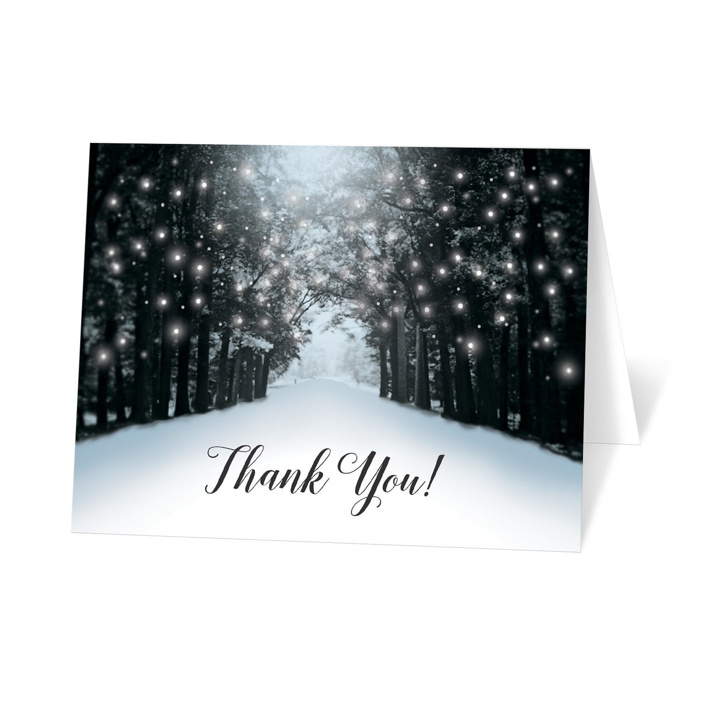 Snowy Winter Road Tree Lights Thank You cards at Artistically Invited. Snowy winter road tree lights thank you cards with a snowy tree lined road filled with white holiday lights. "Thank You!" is printed in a black script font below the design over a snow white background.