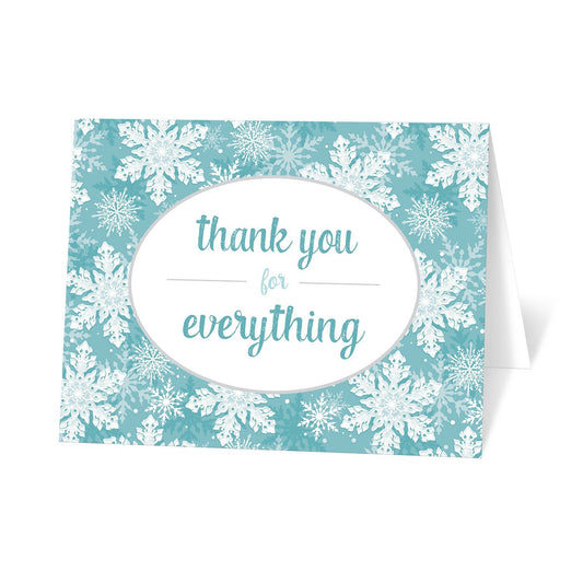 Teal Snowflake Winter Thank You Cards at Artistically Invited Teal snowflake winter thank you cards that are designed with 'thank you for everything' printed in teal in a white oval frame design over a teal, turquoise, and white snowflake pattern background.