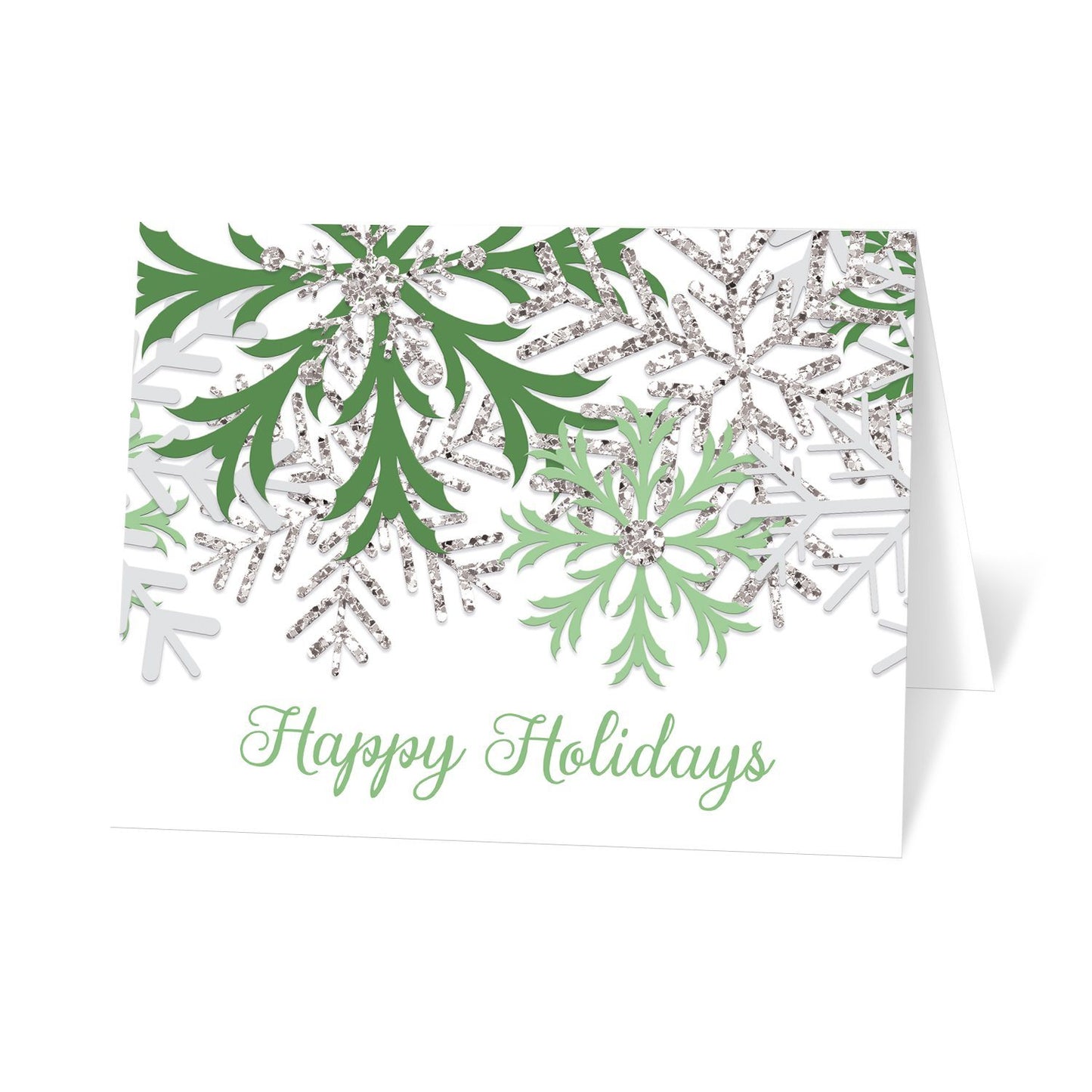 Winter Green Silver Snowflake Holiday Cards at Artistically Invited. Modern Winter green Holiday cards designed with green, light gray, and silver glitter-illustrated snowflakes over a white background. 'Happy Holidays' is printed in a whimsical green script font over the white below the snowflakes. 