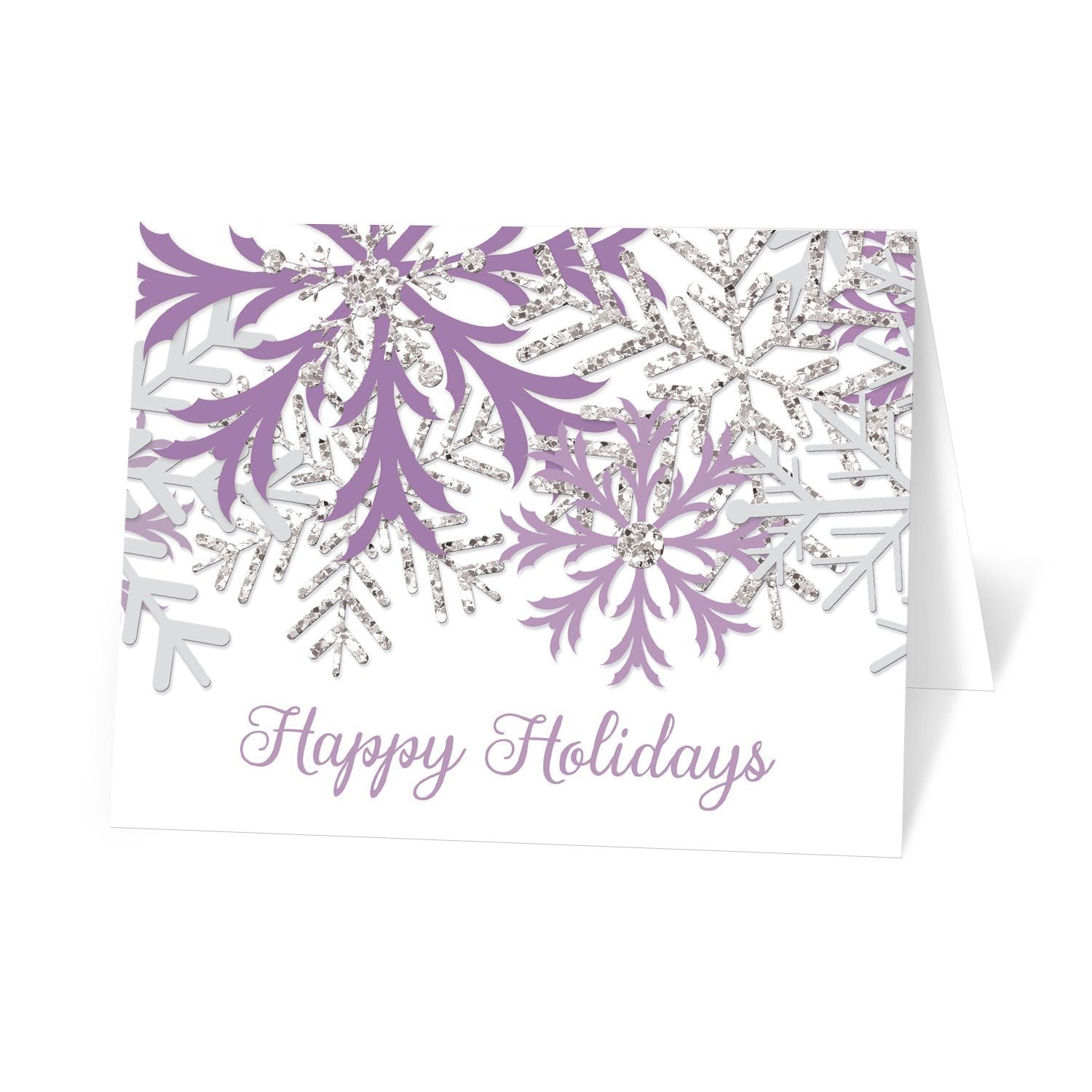 Winter Purple Silver Snowflake Holiday Cards at Artistically Invited. Modern winter purple holiday cards designed with purple, light gray, and silver glitter-illustrated snowflakes over a white background. 'Happy Holidays' is printed in a whimsical purple script font over the white below the snowflakes. 