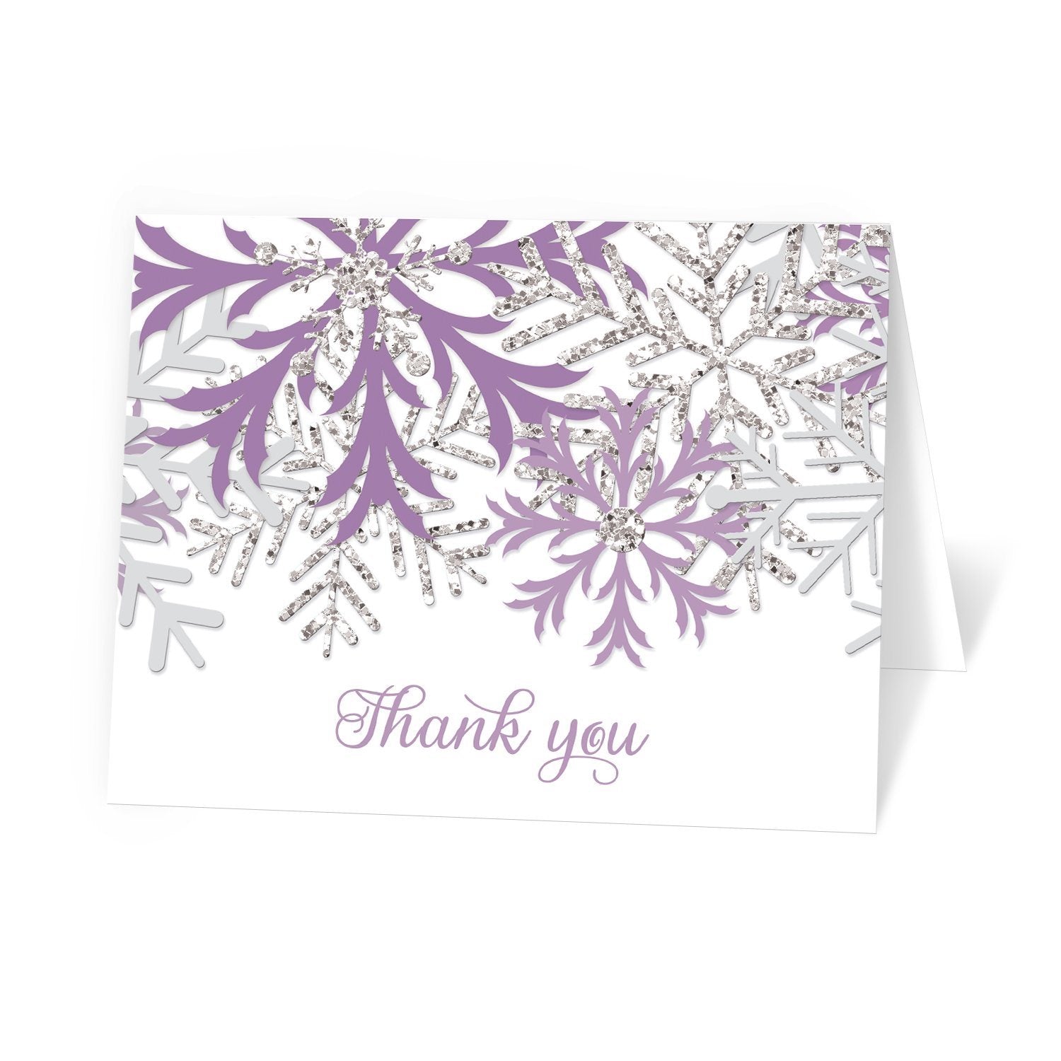 Winter Purple Silver Snowflake Thank You Cards at Artistically Invited. Winter purple silver snowflake thank you cards with purple and silver-colored glitter-illustrated snowflakes over a white background and 'Thank you' printed in a whimsical purple script font.