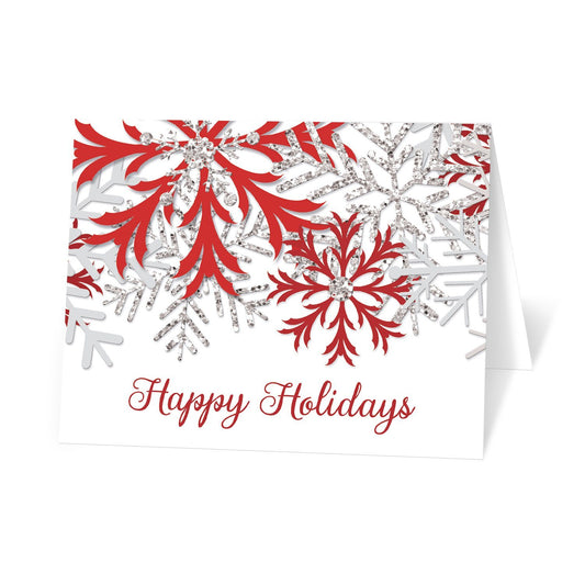 Winter Red Silver Snowflake Holiday Cards at Artistically Invited. Modern winter red holiday cards designed with red, light gray, and silver glitter-illustrated snowflakes over a white background. 'Happy Holidays' is printed in a whimsical red script font over the white below the snowflakes. 