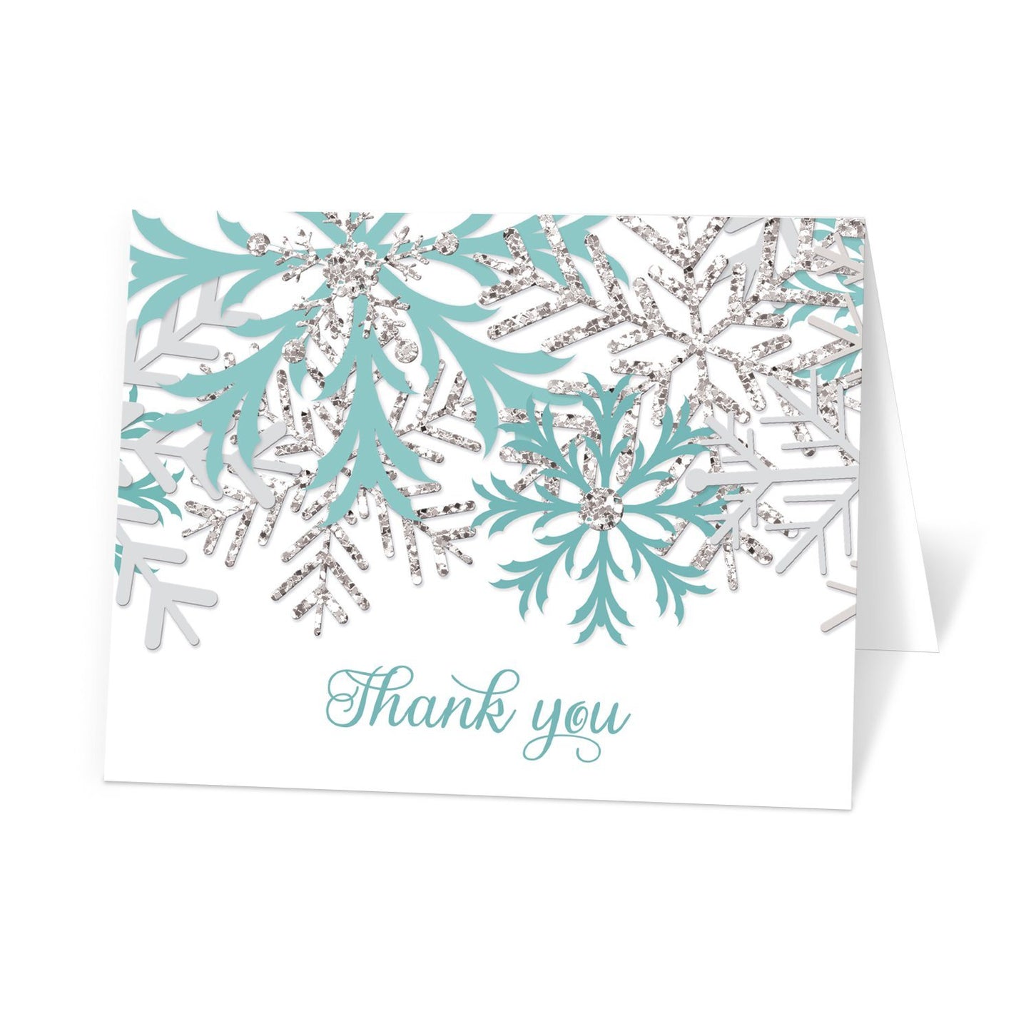 Winter Teal Silver Snowflake Thank You Cards at Artistically Invited. Winter teal silver snowflake thank you cards with teal and silver-colored glitter-illustrated snowflakes over a white background and 'Thank you' printed in a whimsical teal script font.